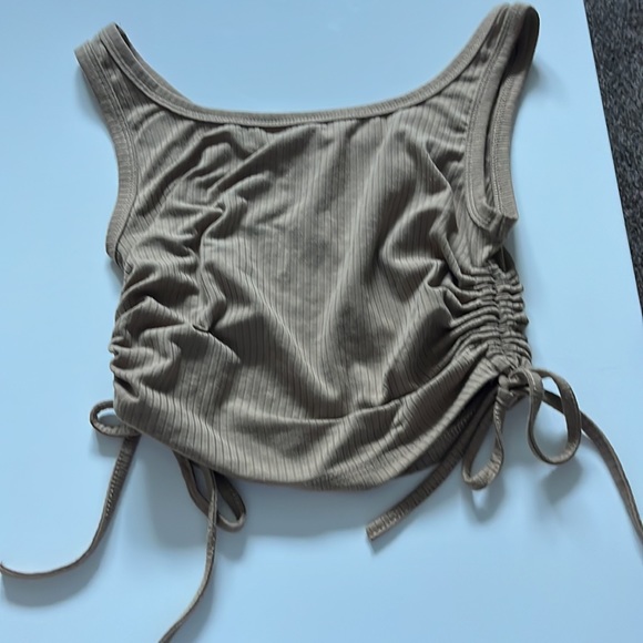 Adjustable length with strings. Light brown/tan crop top. - Picture 2 of 4